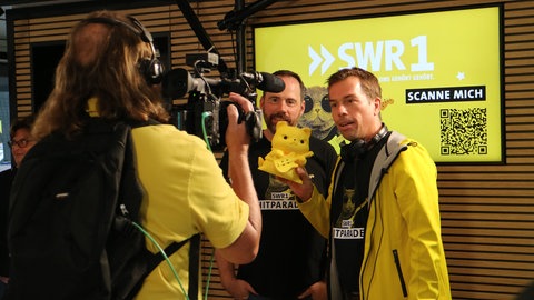 SWR1 Moderatoren Torsten Buschmann und Veit Berthold bei der Hitparade 2025