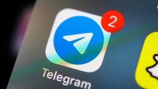 Messenger Dienst Telegram App auf Handy Display