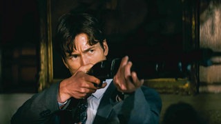 Schauspieler Glen Powell als Becket Redfellow in "How to make a Killing"