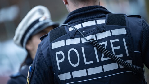 Symbolbild Razzia Polizist