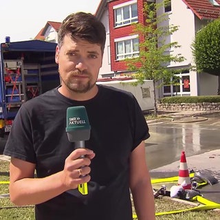 Martin Hattenberger berichtete live aus Oberteuringen zu den Folgen des Starkregens.