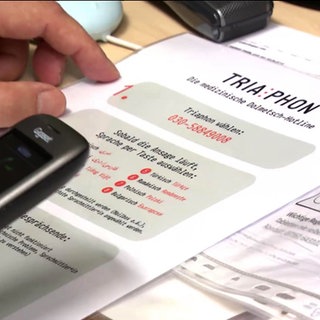 Infomaterial einer Dolmetscher Hotline