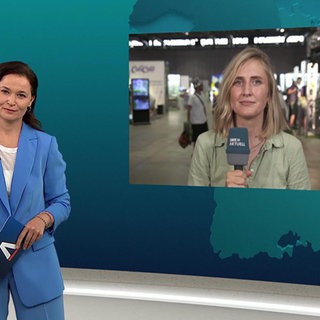 Nachrichtensprecherin Diana Hörger mit zugeschalteter Reporterin