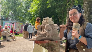 Steinmetzin beim Europäischen Steinfestival in Freiburg