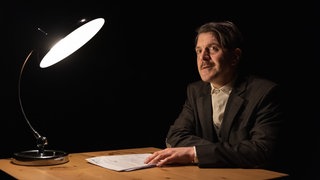 Schauspieler Jan Uplegger bei der Lesung 