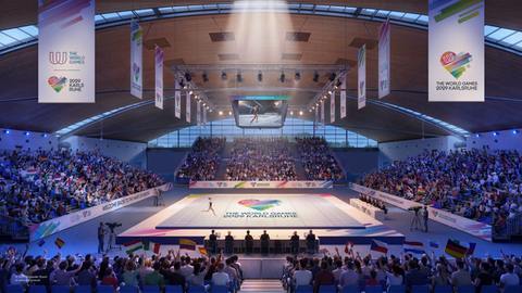 Illustration: Modell Messehalle Karlsruhe bei World Games 2029 mit großer Turnfläche in der Mitte, drum herum sind Zuschauerränge.