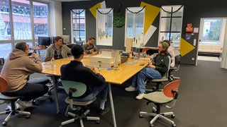 Ein Start-up in Heidelberg bei einem Meeting