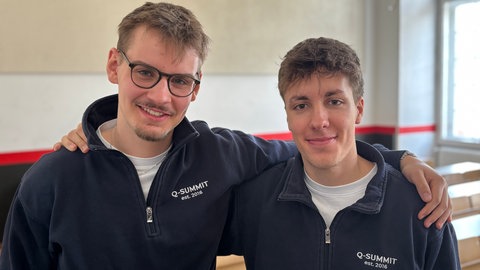 Konstantin Wadé und Nick Jüttner auf dem Q-Summit in Mannheim
