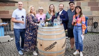 Weindorf-Treff 2026 Stuttgart mit der Pfännle-Moderatorin Petra Klein mit Gäste: Ferdinand Eppli, (Betriebswirt, Diamantengutachter, Versteigerer), Michael Nagl (Bassbariton, Oper), Constanze Müller (Theaterleiterin STAGE Theater Stuttgart) und Weinprinzessin Anna Maria Joos 