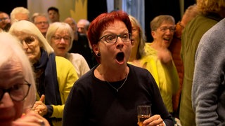 Die Grünen in Freiburg feiern den Sieg ihrer Partei bei der Landtagswahl 2026 in Baden-Württemberg.