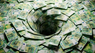 Mehrere 100-Euro-Scheine werden in einen Sog gezogen.