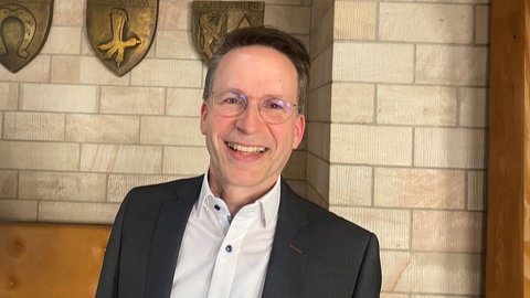 Der Geschäftsführer des Zweckverbands Öffentlicher Personennahverkehr RLP Süd Michael Heilmann.