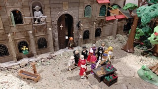 Historische Szene mit Playmobil-Figuren: Der "Adventsstreit" ist beigelegt