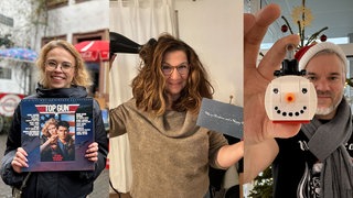 Unsere Kollegen mit ihren Last-minute-Weihnachtsgeschenken