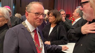 Oberbürgermeister Klaus Blettner (CDU) beim Neujahrsempfang. Im Hintergrund Alt-Oberbürgermeisterin Eva Lohse (CDU)
