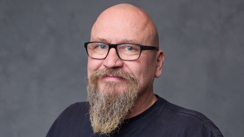 Ein Bild vor einer grauen Wand von Ullrich Bohland 