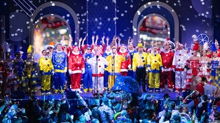 Die Mainzer Hofsänger auf der Bühne: Sie werden mit dem Mainzer Fastnachtsmotto 2026 geehrt. 