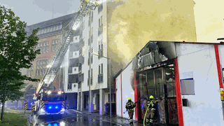 Die Feuerwehr löscht einen Brand in einer Werkstatt in Worms.