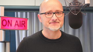 Andreas Adam am Mikrofon