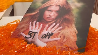 Foto von Manfred Arnoldi in der Kioskbühne Trier zum Orange Day