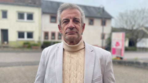 Karl Metz ist kein Fan von Donald Trump. Deswegen gerät er immer öfter mit Amerikanern in Streit. 