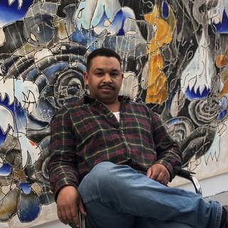 Der 1985 in ZariaNigeria geborene Ulrich Okujeni