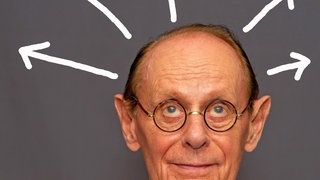 Aus dem Kopf eines Mannes weisen Pfeile: Wer sich zwingt, etwas vergessen zu wollen, bewirkt oft das Gegenteil.