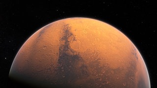 Computergrafik der beleuchteten Seite des Mars im Weltall.