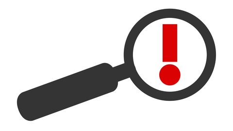 Lupe mit Ausrufezeichen (Symbolbild)