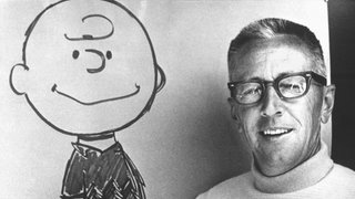 Charles M. Schulz neben einer Zeichnung von Charlie Brown: Charles Monroe Schulz (1922 - 2000) war ein US-amerikanischer Comiczeichner und der Erfinder der Comicserie "Die Peanuts"