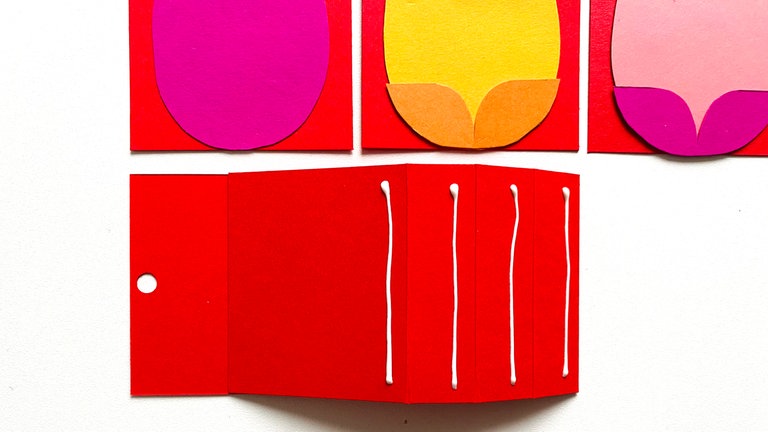 4 dünne Klebestreifen unter jedem Falz anbringen.