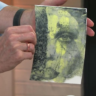 Kunstdruck eines weiblichen Gesichts