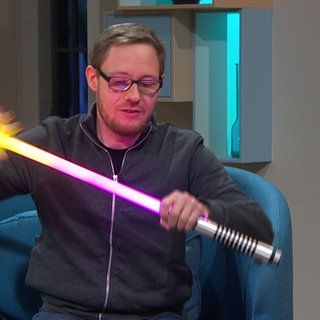 Markus Hanke mit einem Lichtschwert