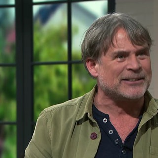 Die richtige Körpersprache: So bringen Sie eine positive Stimmung in Gespräche und wirken selbstbewusster