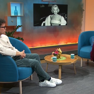 SWR Kulturredakteur Karsten Umlauf und Moderatorin Evelin König