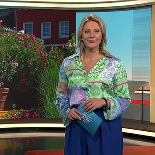 Moderatorin Jana Kübel
