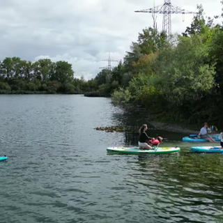 Stand-up-Paddling mit Hund