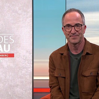 Moderator Jürgen Hörig