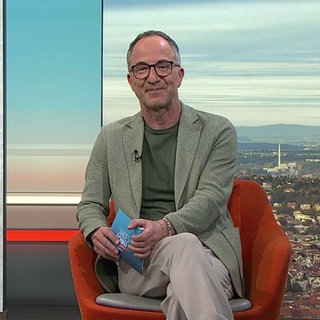 Moderator Jürgen Hörig