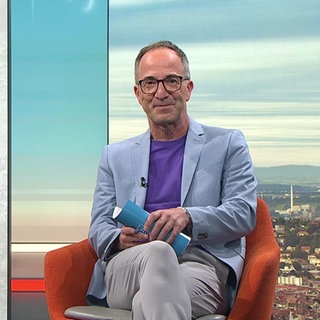 Moderator Jürgen Hörig
