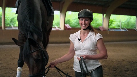 Para-Dressurreiterin Anna-Katharina Thiel-Albus und ihr Pferd.