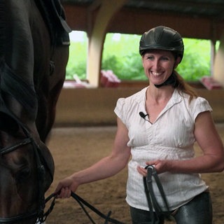 Para-Dressurreiterin Anna-Katharina Thiel-Albus und ihr Pferd.