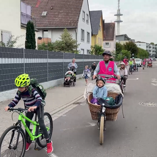 Elterntaxi auf dem Fahrrad