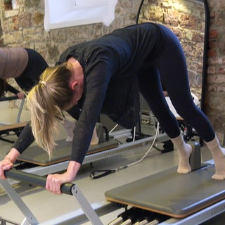 Reformer Pilates ist ein neuer Trend.