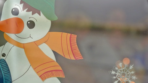 Fensterbild mit Schneemann
