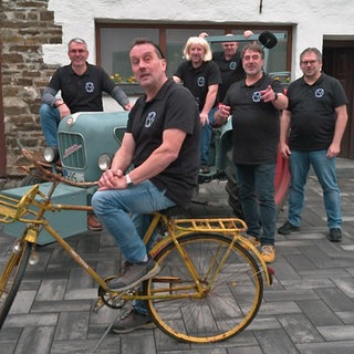 Die Keiler Männer stellen eine Rätselfrage