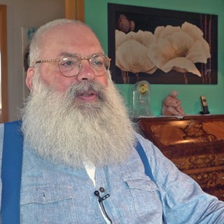 Der Rheinhesse Stefan Hofmeister ist mit seinem sibrig-weißen kreisrunden Vollbart schottischer Meister